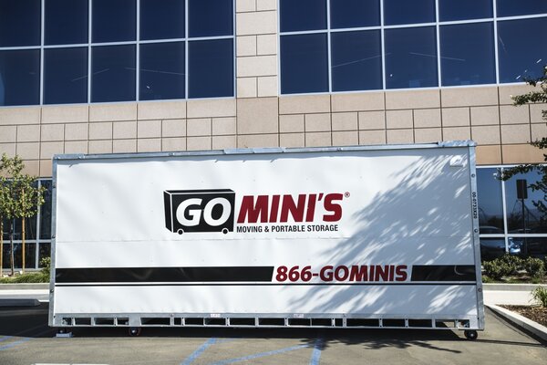 Business with Go Mini's storage container in parking lot