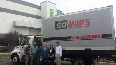 Happy clients in front of Go Mini's truck