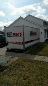 go minis unit in front of house