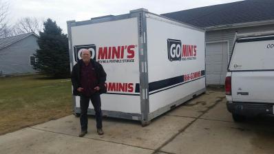 man in front of go minis unit