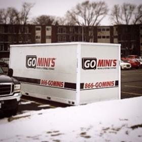 go minis unit in parking lot with snow