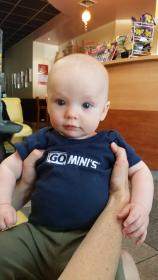Baby wearing Go Mini's shirt